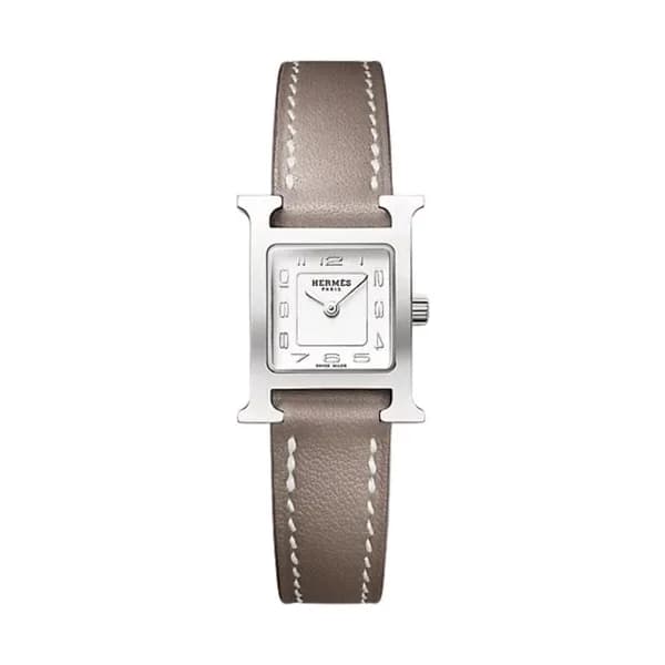 Hermès Montre HERMÈS Heure H Mini Modèle quartz cadran argenté bracelet cuir veau Swift étoupe 21 mm