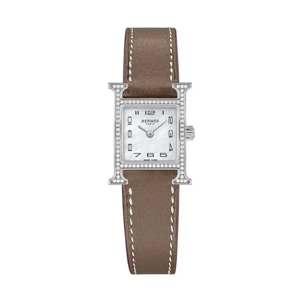 Hermès Montre HERMÈS Heure H Mini Modèle sertie quartz cadran nacre blanche bracelet cuir taupe 21 mm