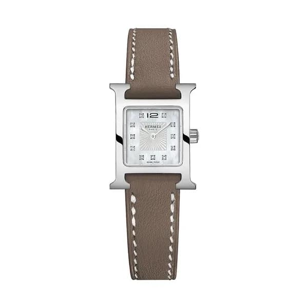 Hermès Montre HERMÈS Heure H Mini Modèle quartz index diamants cadran nacre blanche bracelet cuir taupe 21 mm